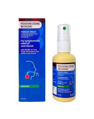 Betadine Box and Spray Front A blue box beside a yellow spray bottle of Betadine Povidone Throat Spray