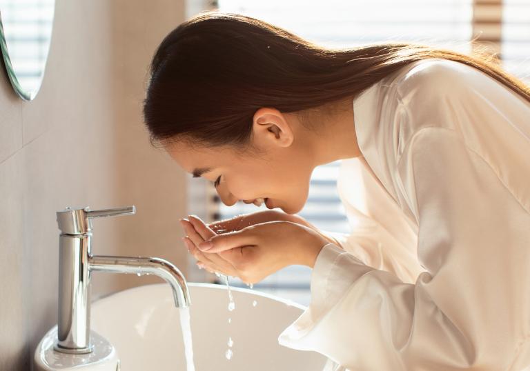 girl washing her face