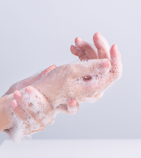 washing hands in soap