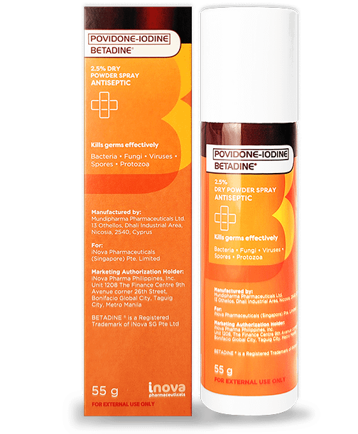 An orange box beside a bottle of Betadine Povidone Iodine Antiseptic Dry Powder Spray